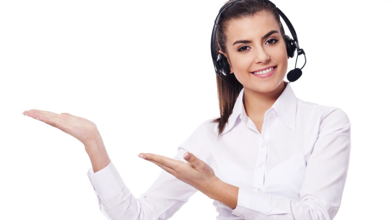 Smiling woman in headset presentation something Smiling woman in headset presentation something